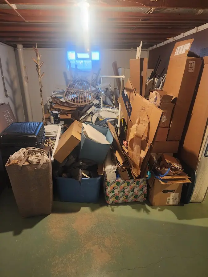 Roll-off dumpster container at job site for Construction Dumpster Rental in Lyons